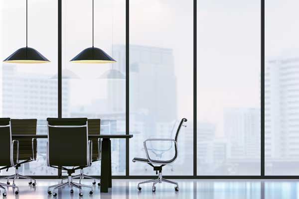 A meeting room with big glass windows looking out on downtown Phoenix awaits your direct hire staff from Scion Staffing